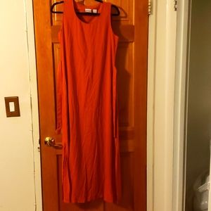 Sleeveless long dress with splits on the side